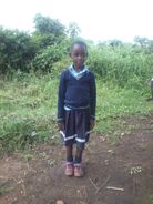 Hellen Able Nyangoma. 7 years.